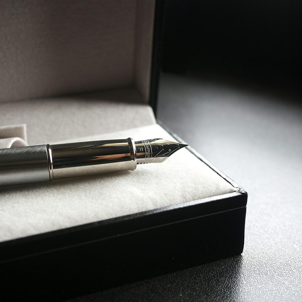 Close-up of a luxury fountain pen in a velvet-lined box, perfect for gifting.